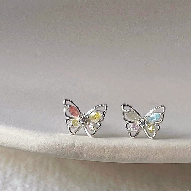 Venta al por mayor Zirconia mariposa pendientes de aleación