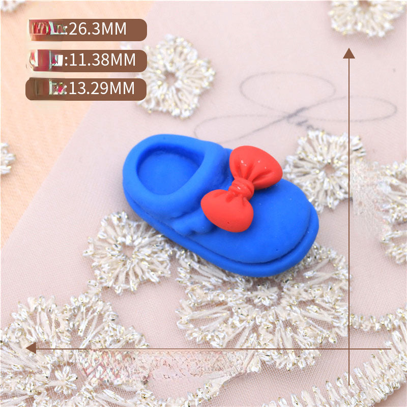 Caricatura al por mayor accesorios de resina linda zapatilla