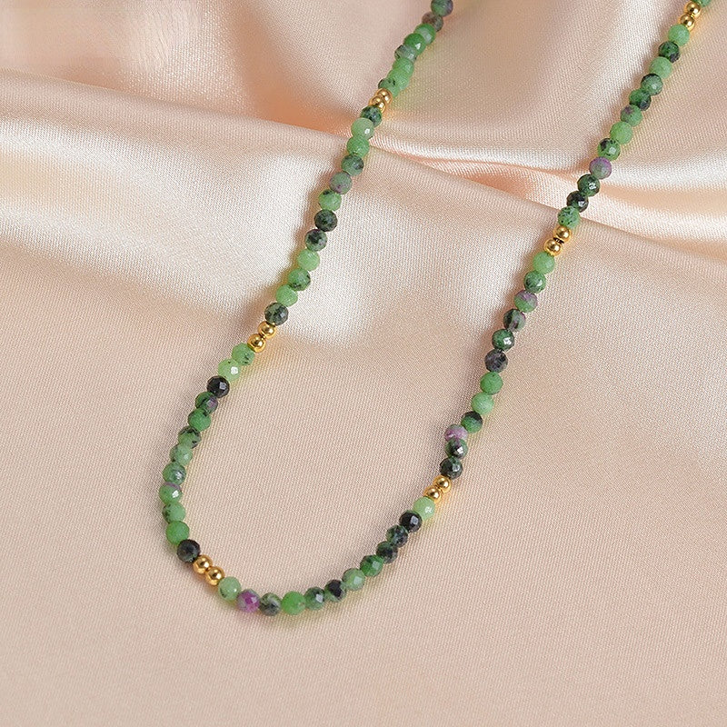 Venta al por mayor de titanio acero verde cuentas ocho Mangxing Cruz sol colgante collar