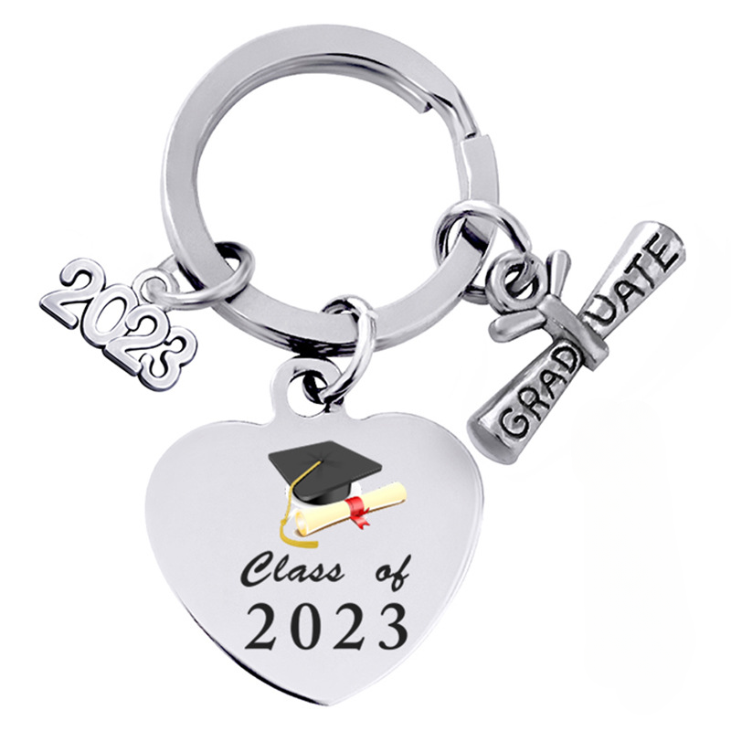 Temporada al por mayor de graduación Regalo Impresión de color en forma de corazón Llavero de acero inoxidable
