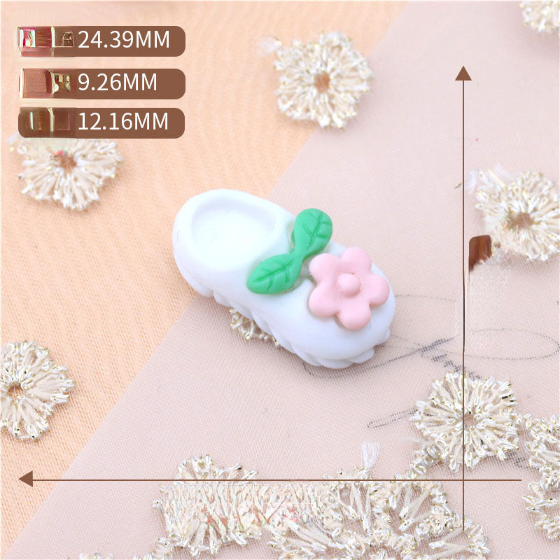 Caricatura al por mayor accesorios de resina linda zapatilla