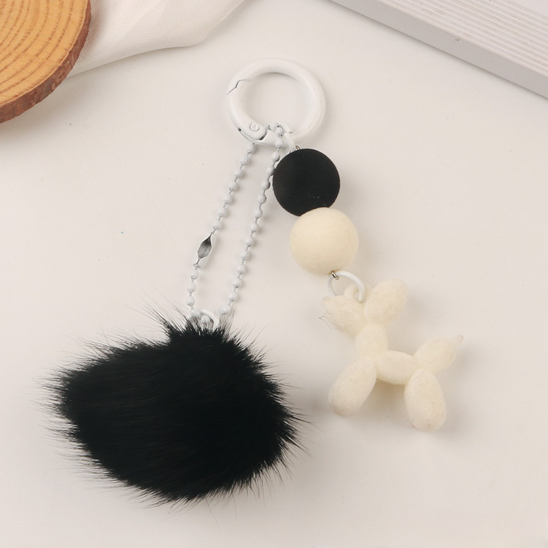 Resina al por mayor llavero de pelota de pelaje lindo cachorro