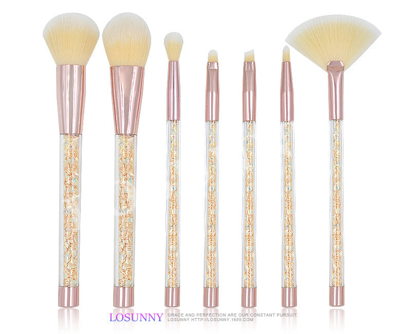 Plastic al por mayor de 7 piezas Mango de partícula de cristal transparente Juego de cepillo de maquillaje