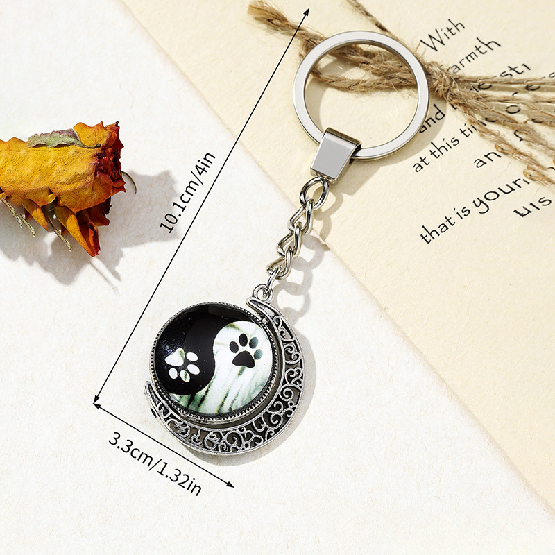 Claw de perro al por mayor Yin Yin Yang Tai Chi Keychain de metal rotable