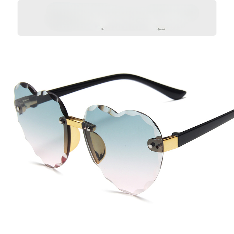 Gafas de sol para niños con diseño de corazón de melocotón degradado sin marco para PC al por mayor