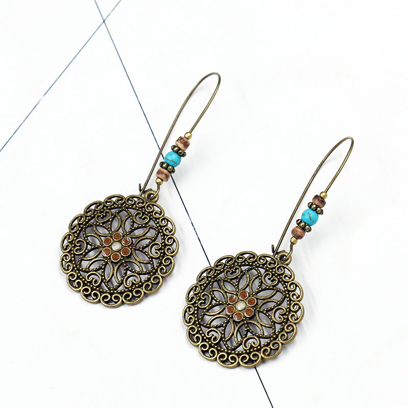 Wholesale Round Hollow Flowers Alloy Earrings