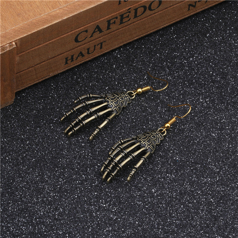 Pendientes De Aleación De Palma De Nudillo De Calavera al por mayor