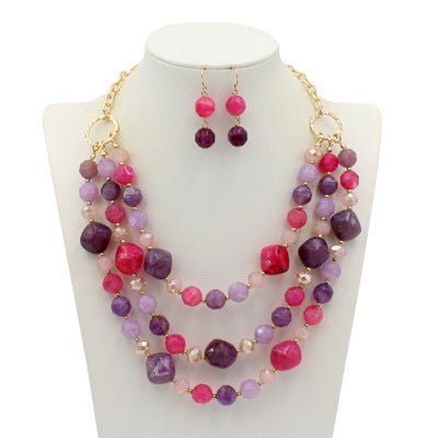 Comercio al por mayor de múltiples capas de plástico aretes collar conjunto de joyas