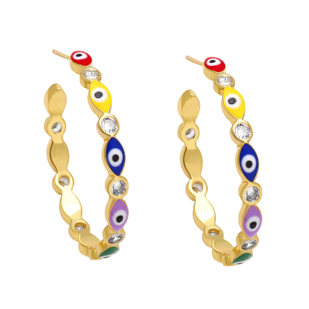 Comercio al por mayor colorido goteo de aceite ojo del diablo pendientes de cobre