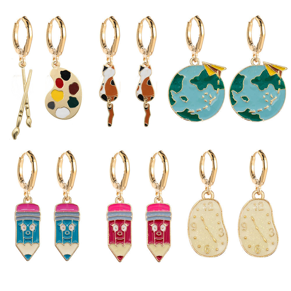 Venta al por mayor Día del maestro Cepillos Despertador Tierra Pendientes de metal