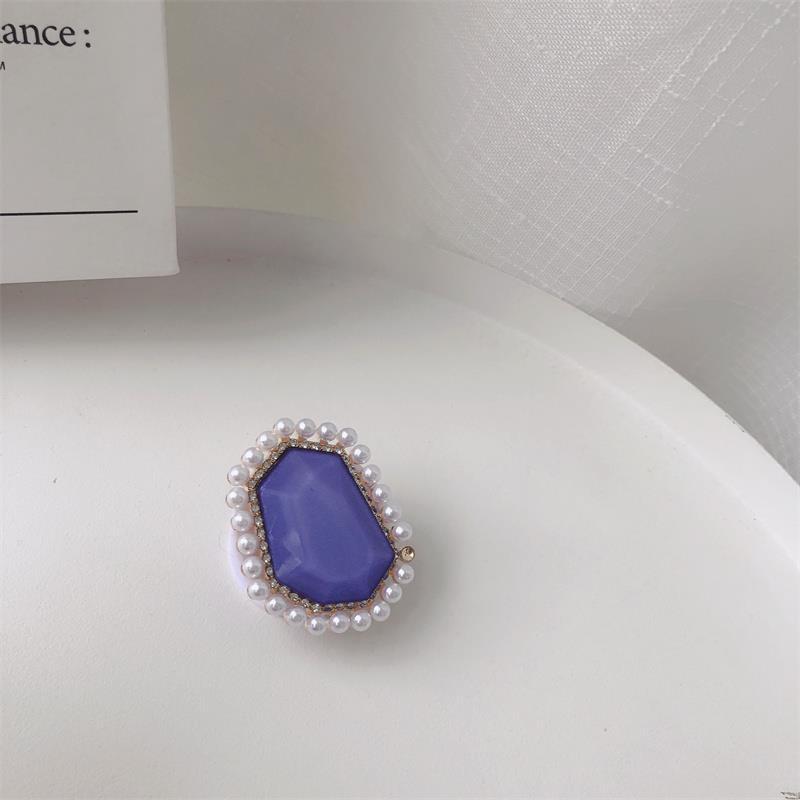 Venta al por mayor Soporte para teléfono móvil de perlas de piedras preciosas