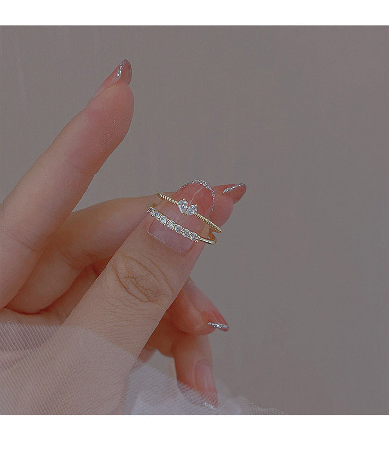 Anillos de diamantes de Heart Row de metal al por mayor