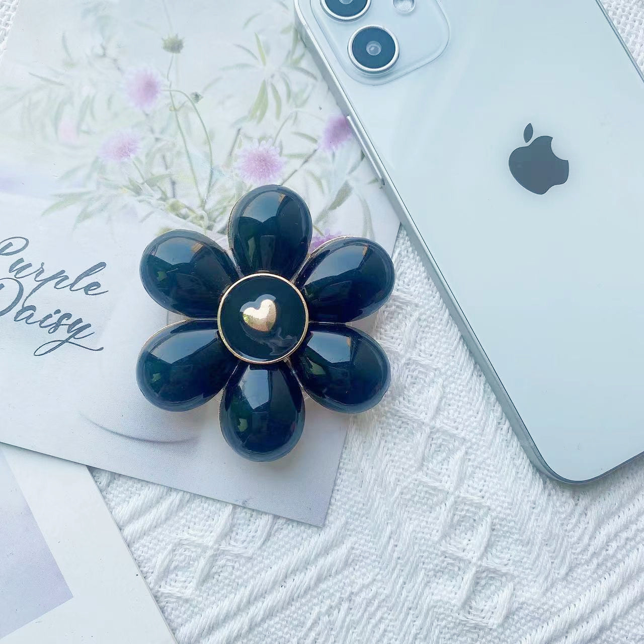 Soporte de teléfono móvil plegable Camellia de resina al por mayor