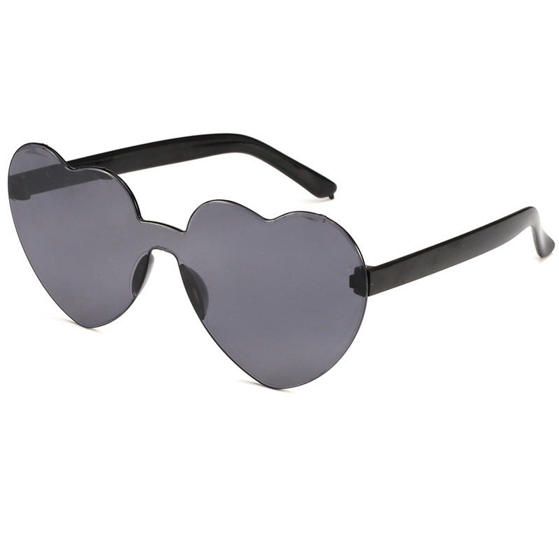 Venta al por mayor Gafas de sol sin marco divertidas para damas PC