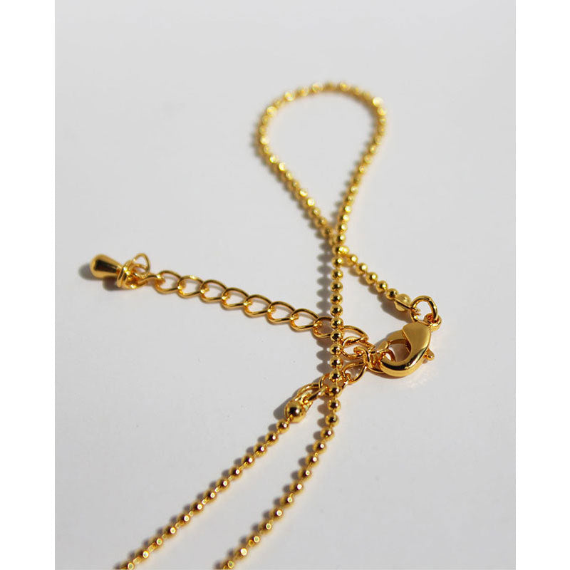 Venta al por mayor de cobre tridimensional en relieve figura disco colgante suéter collar