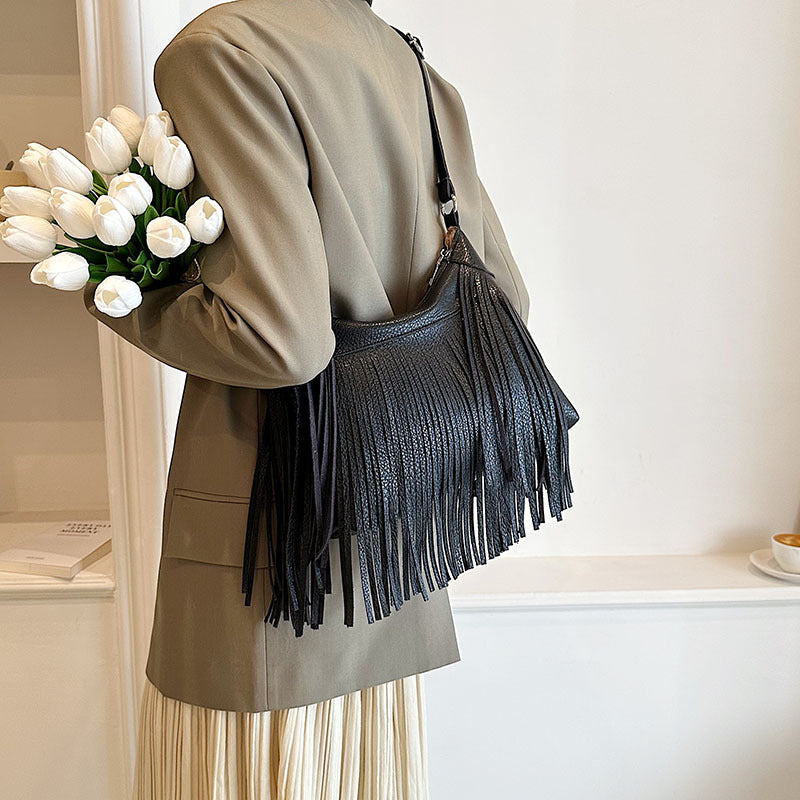 Venta al por mayor Bolso de cubo diagonal con borla de PU