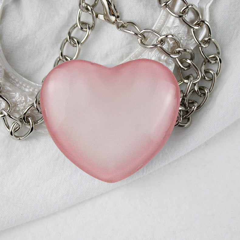 Soporte de teléfono de vidrio de corazón pequeño de melocotón al por mayor