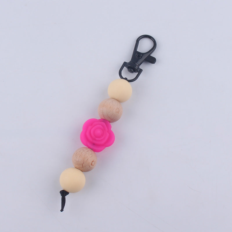 Llavero de cuentas de madera de rosa de silicona al por mayor