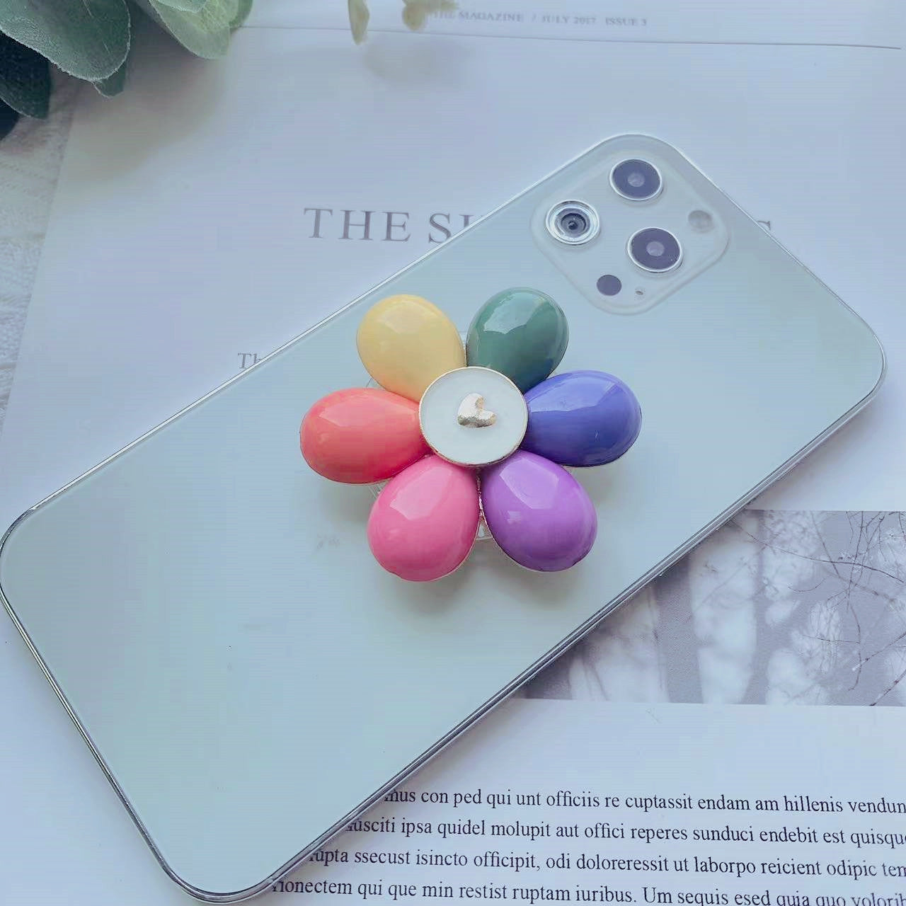 Soporte de teléfono móvil plegable Camellia de resina al por mayor