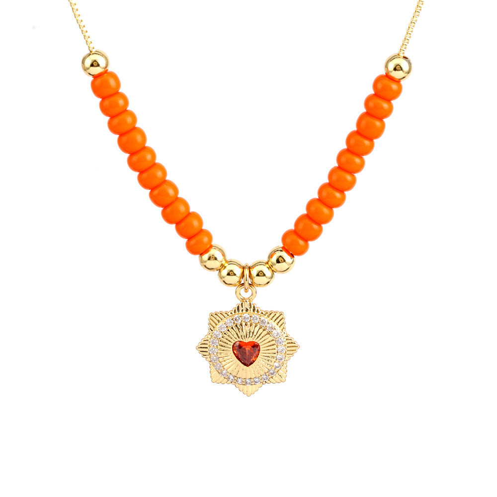 Collar con colgante de ojo mágico en forma de corazón de cobre al por mayor