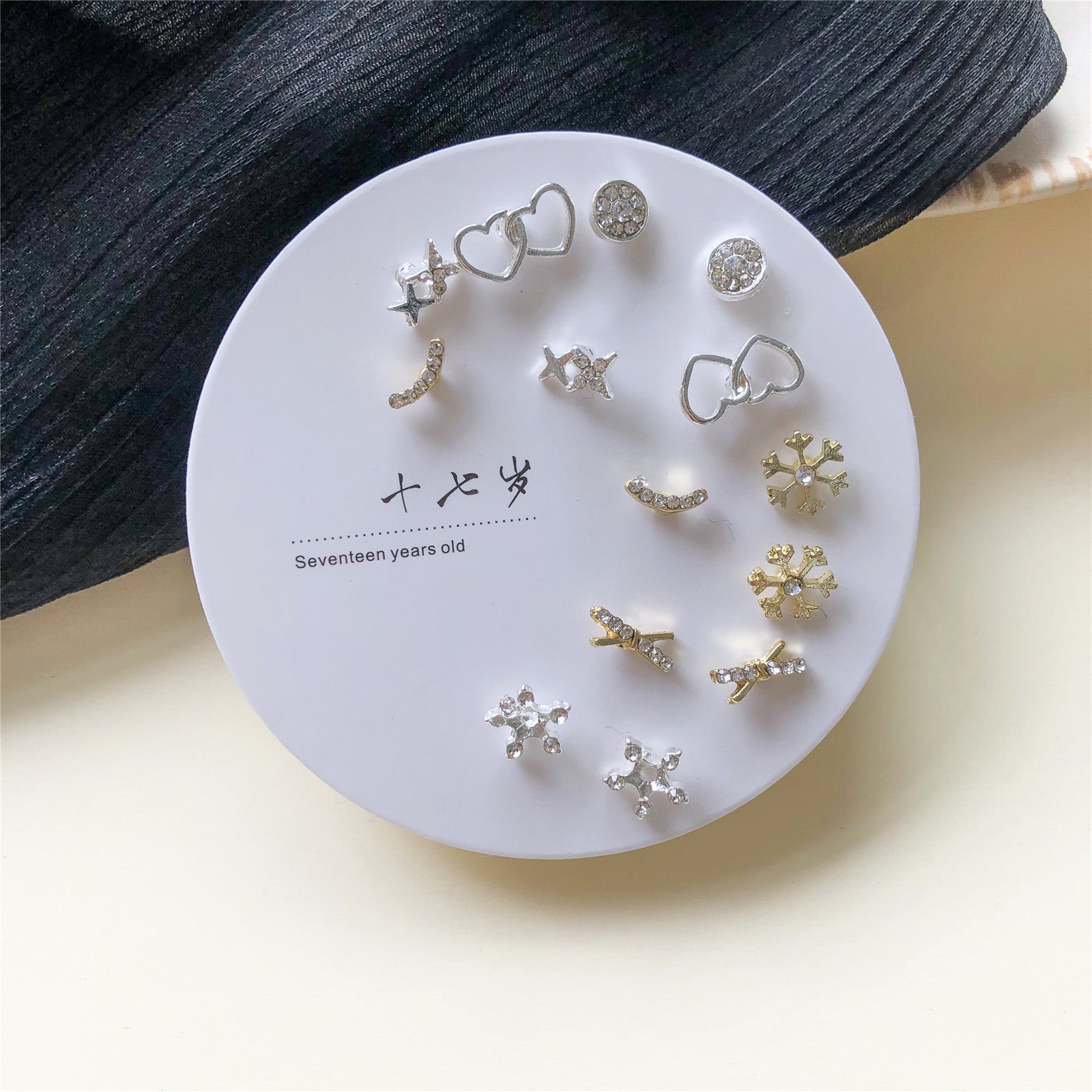 Venta al por mayor Conjunto de aretes de una semana Aretes de aleación