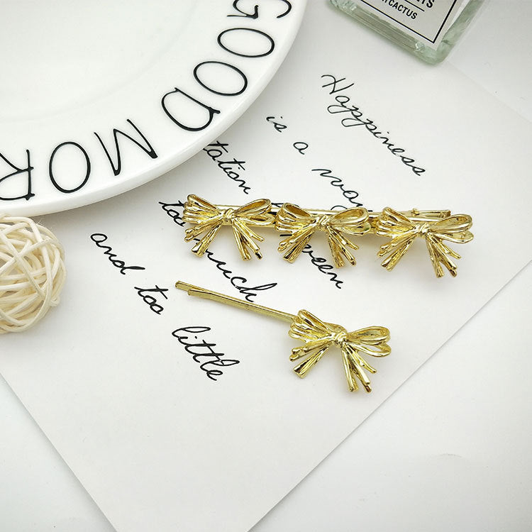 Wholesale Bowknot Glossy Alloy Hair Clips Set