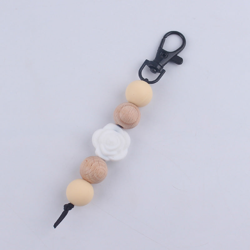 Llavero de cuentas de madera de rosa de silicona al por mayor