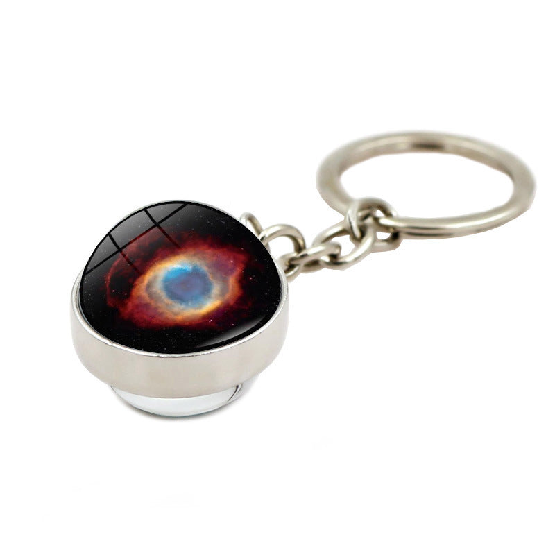 Llavero creativo al por mayor de la nebulosa de la galaxia del ojo de Dios de la aleación del cinc