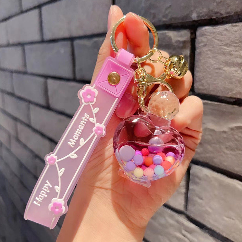 Botella de perfume acrílico al por mayor burbujas de burbujas y llavero de botella de deriva