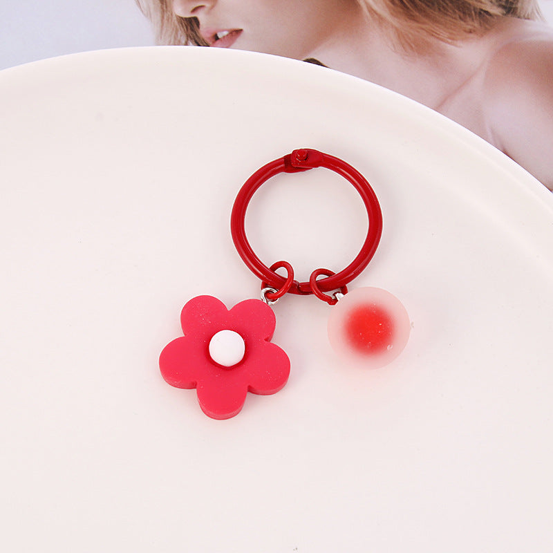 Llavero de flores de color de resina al por mayor