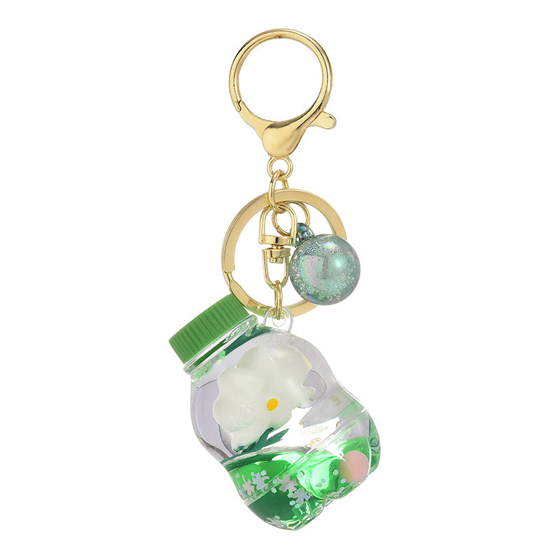 Llavero creativo de flores flotantes aceitadas de acrílico al por mayor
