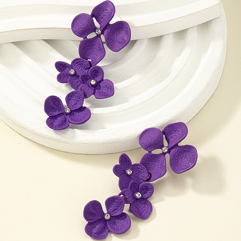 Pendientes Largos De Aleación De Pintura Metálica De Flores al por mayor