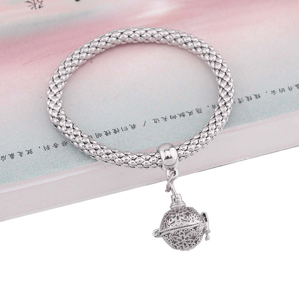 Jaula de aromaterapia al por mayor Pulsera de cobre con palomitas de maíz