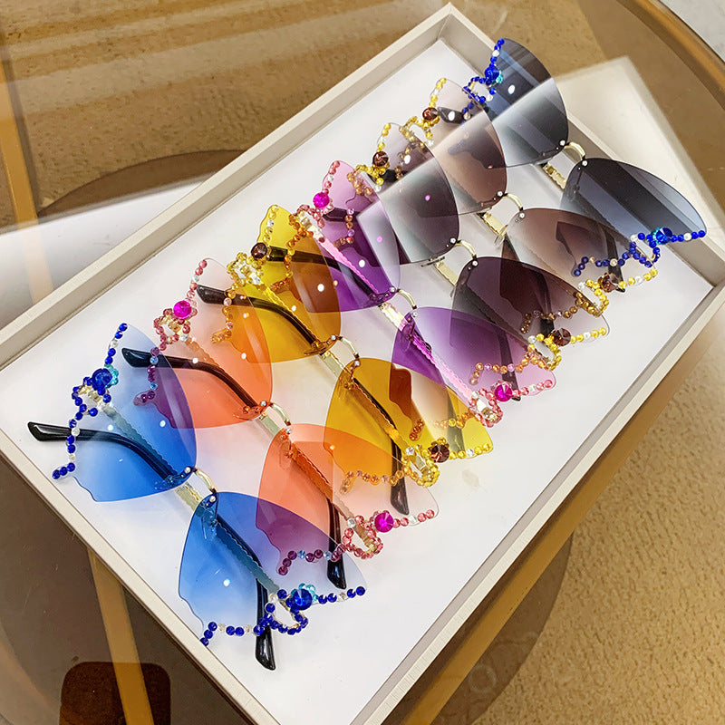 Wholesale Butterfly Shape Diamond Rimless PC Sunglasses