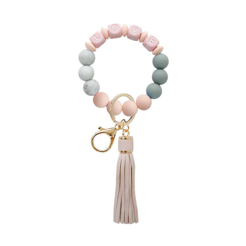 Wholesale LOVE Letters Silicone Beaded Tassel Wrist Keychain