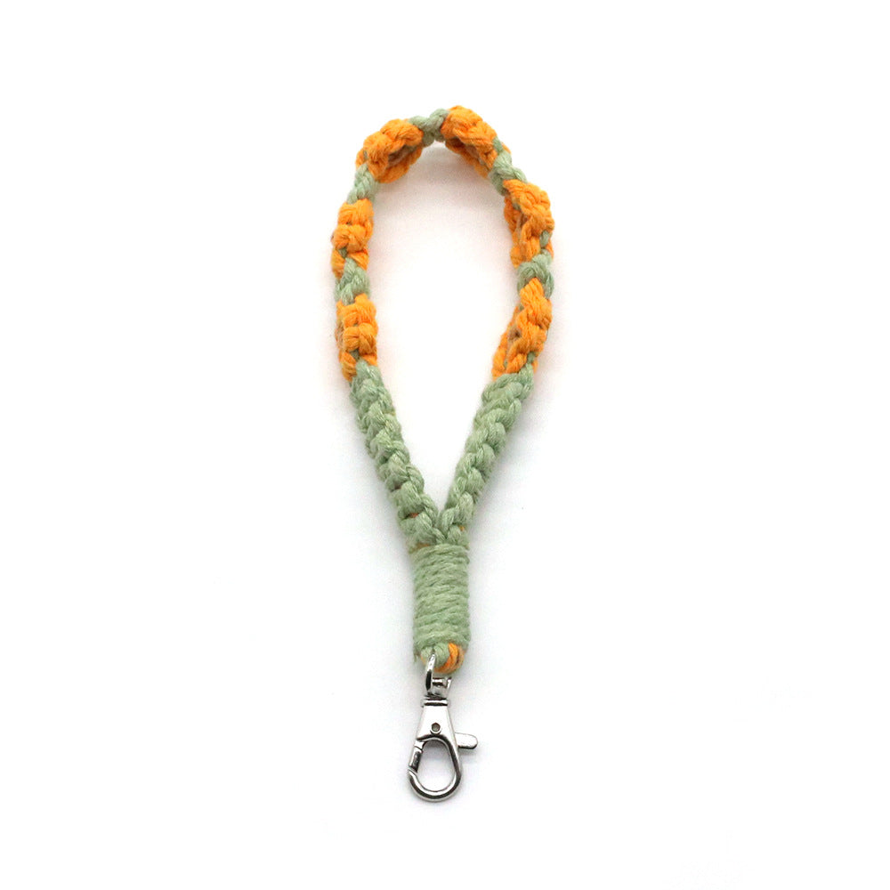 Venta al por mayor Llavero trenzado de flor pequeña de metal