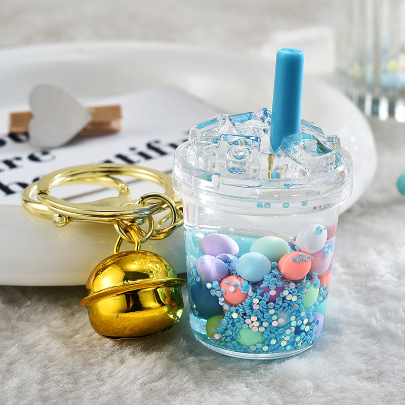 Llavero creativo al por mayor de la botella de la arena movediza de la taza del iceberg de acrílico