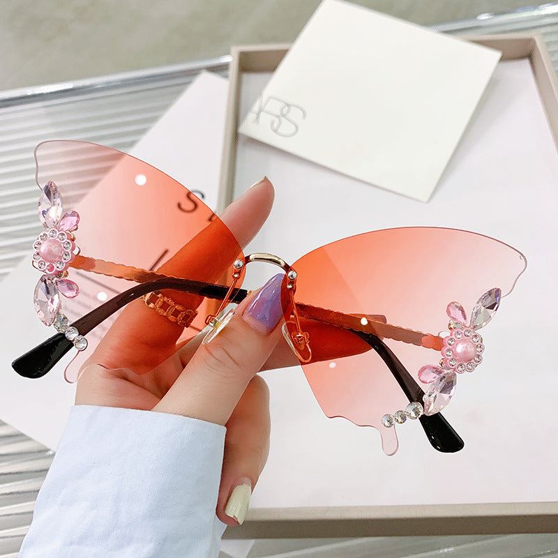 Wholesale Butterfly Diamond Rimless PC Sunglasses