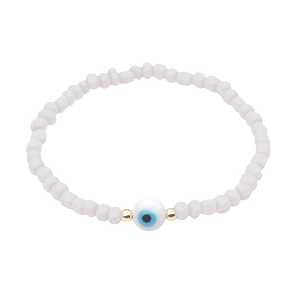 Venta al por mayor Devil Eyes White Glass Rice Beads Bracelet