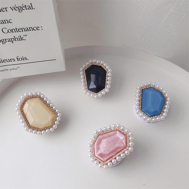 Venta al por mayor Soporte para teléfono móvil de perlas de piedras preciosas