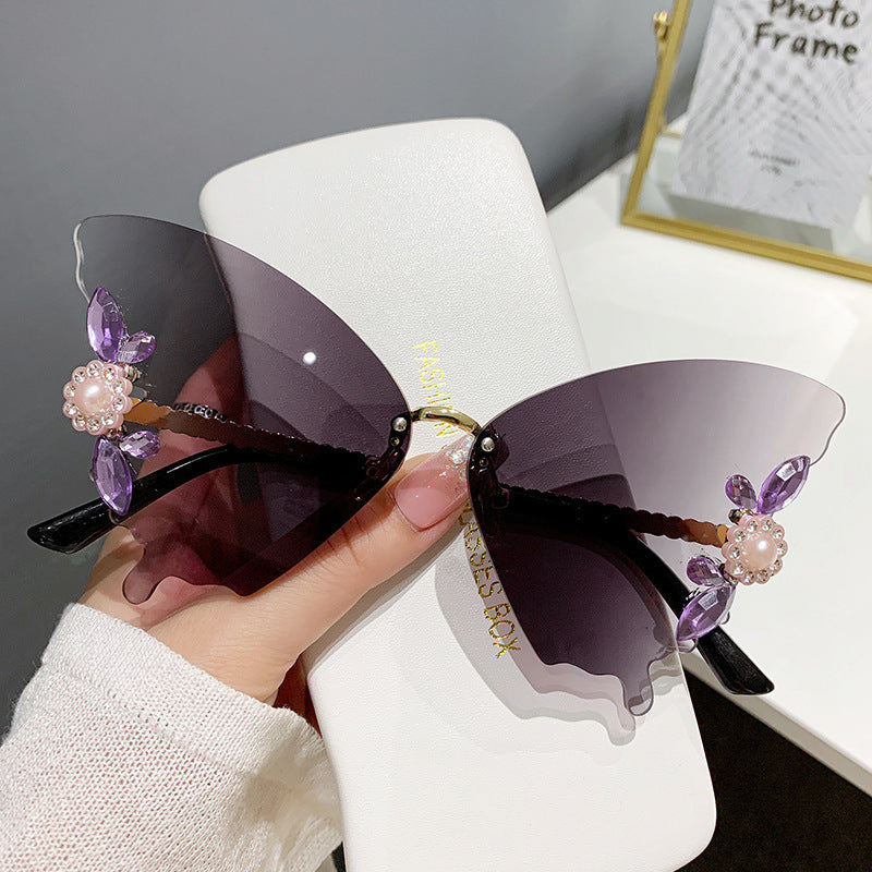 Wholesale Butterfly Diamond Rimless PC Sunglasses