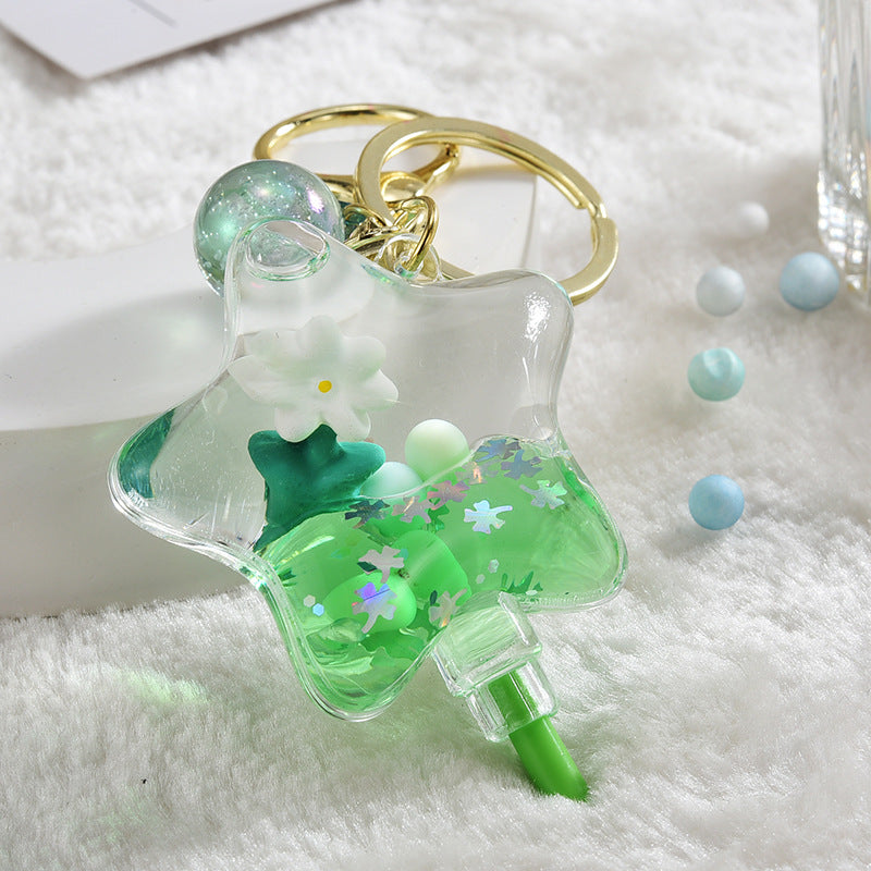 Llavero creativo de flores flotantes aceitadas de acrílico al por mayor