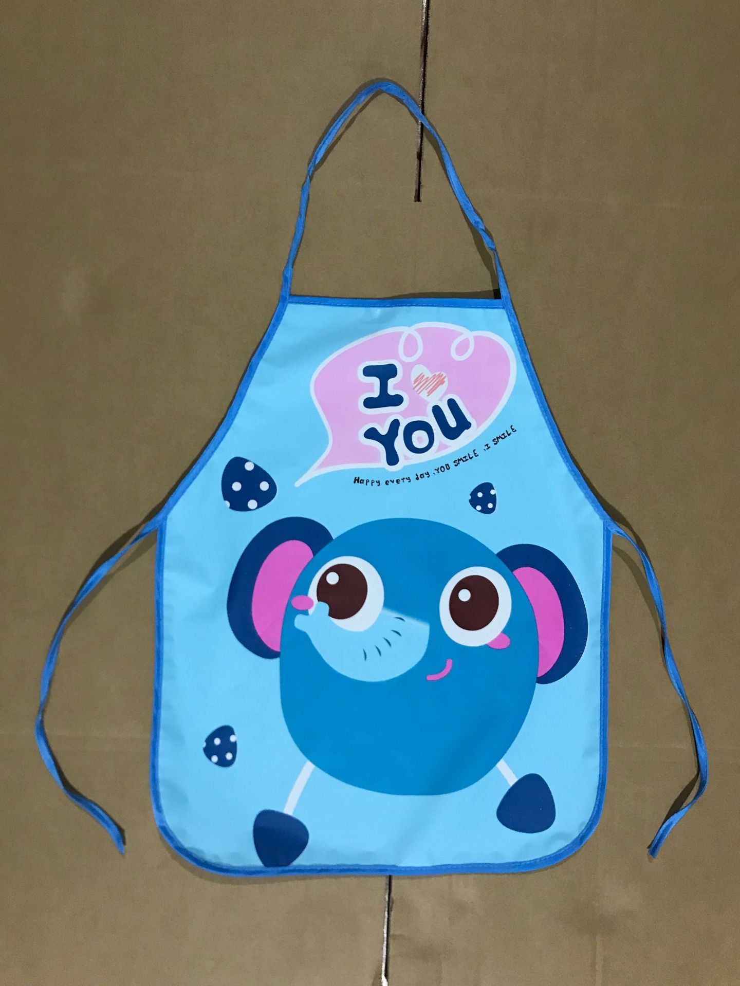 Delantal impermeable al por mayor de los niños de la historieta del PE