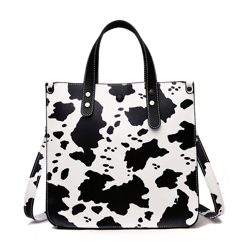 Wholesale PU Cow Print Comb Bag Set
