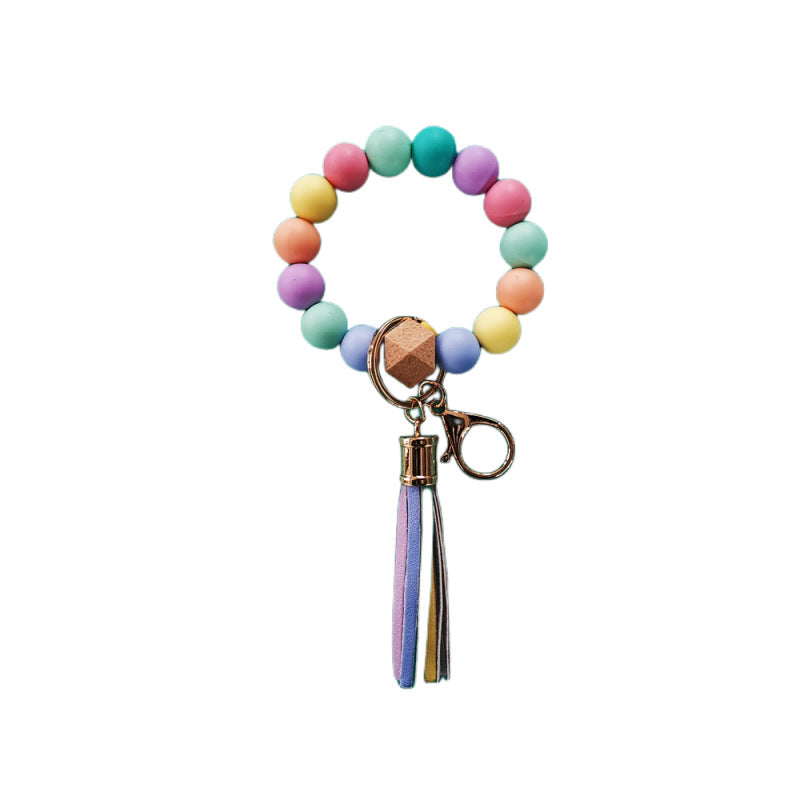 Venta al por mayor Llavero de muñeca con cuentas de silicona de girasol