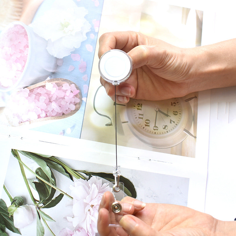 Al por mayor 10pcs PVC Pequeño llavero de botón de extracción