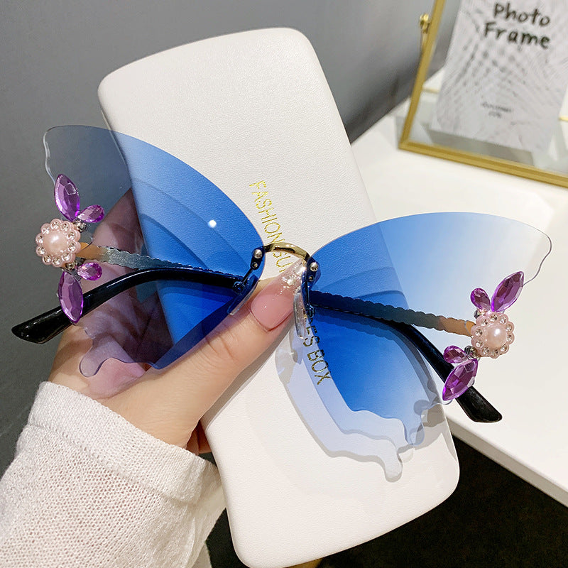 Wholesale Butterfly Diamond Rimless PC Sunglasses
