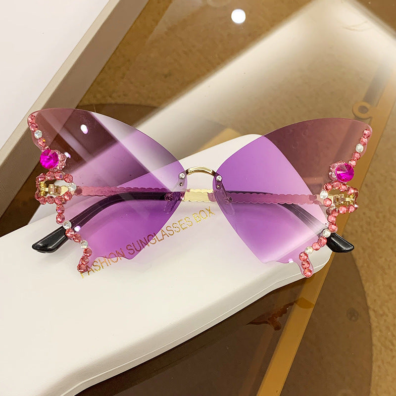 Wholesale Butterfly Shape Diamond Rimless PC Sunglasses