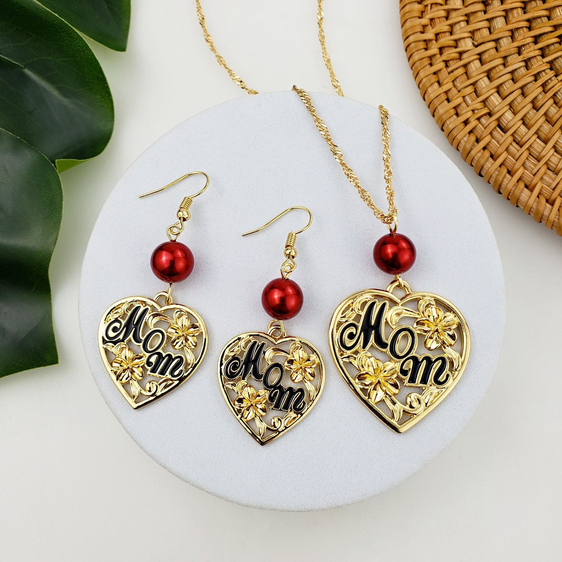 Conjunto de joyería de aretes de aleación hueca de corazón para el día de la madre al por mayor