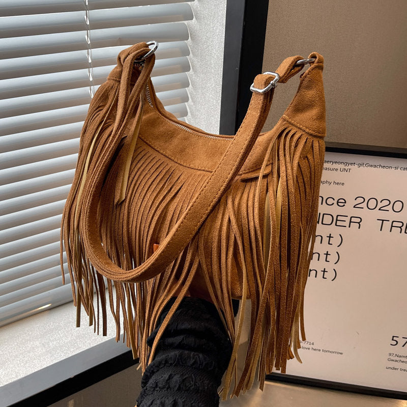 Venta al por mayor Bolso de hombro con borla esmerilada de poliéster